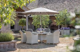 Bramblecrest Monterey 175 X 120cm Elliptical Table With 6 Armchairs & Parasol   Dove Grey