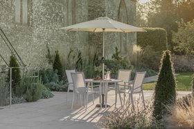 Bramblecrest Sofia 110cm Round Table with 4 Armchairs, Parasol & Base - Grey