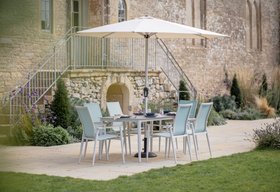 Bramblecrest Sofia 165 x 95cm Rectangle Table with 6 Armchairs, Parasol & Base - Blue