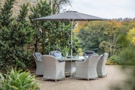 Bramblecrest Wentworth Rattan 6 Seat Elliptical Dining Set with Parasol & Base