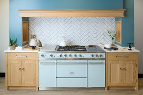 Oak Kitchen With Polished Nickel Handles and Pastel Blue Lacanche Cooker
