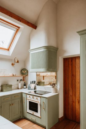 Pistachio Green Kitchen with Brass Details