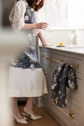 Woman in Shaker Kitchen with Polished Brass Handles