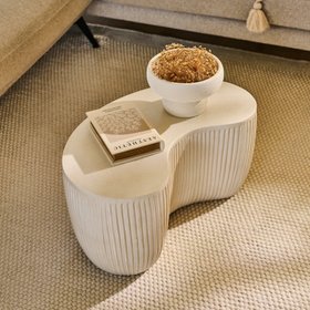 Sohan kidney-shaped concrete side table in sand