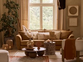 DFS Alani 4 Seater Sofa In Brass And Cream Combination With Oak Panelling, Dwell Eos Coffee Table In Smoke Oak, Available Exclusively At DFS From November 2025