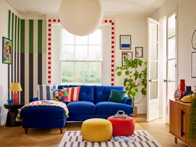 Joules Patterdale Velvet Left Hand Facing Small Chaise Sofa in Deluxe Velvet Royal, available exclusively at DFS, Joules Ashwicke Small Round Footstool in Deluxe Velvet Coral, available exclusively at DFS, Joules Ashwicke Small Round Footstool in Deluxe V