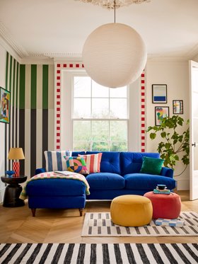 Joules Patterdale Velvet Left Hand Facing Small Chaise Sofa in Deluxe Velvet Royal, available exclusively at DFS, Joules Ashwicke Small Round Footstool in Deluxe Velvet Coral, available exclusively at DFS, Joules Ashwicke Small Round Footstool in Deluxe V