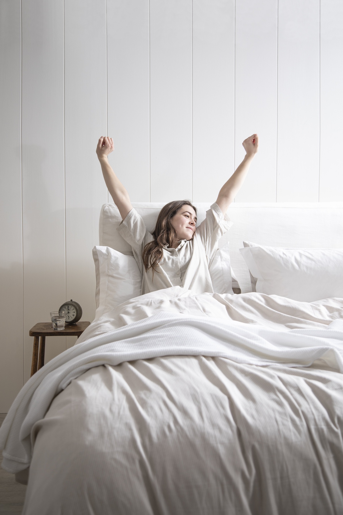 Button & Sprung natural mattress model wake up shot