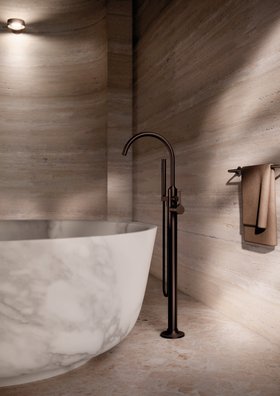 Vaia single lever freestanding bath mixer in Brushed Dark Bronze with hand shower set.