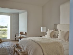 The White Company Kingston Headboard In Natural Linen Blend Union From £900, Lowell Throw £275, Florian Bedspread & Cushion Cover Collection From £35, Huntly Stripe Bed Linen Collection Oxford Pillowcase From £20, Rye Wooden Bench £250