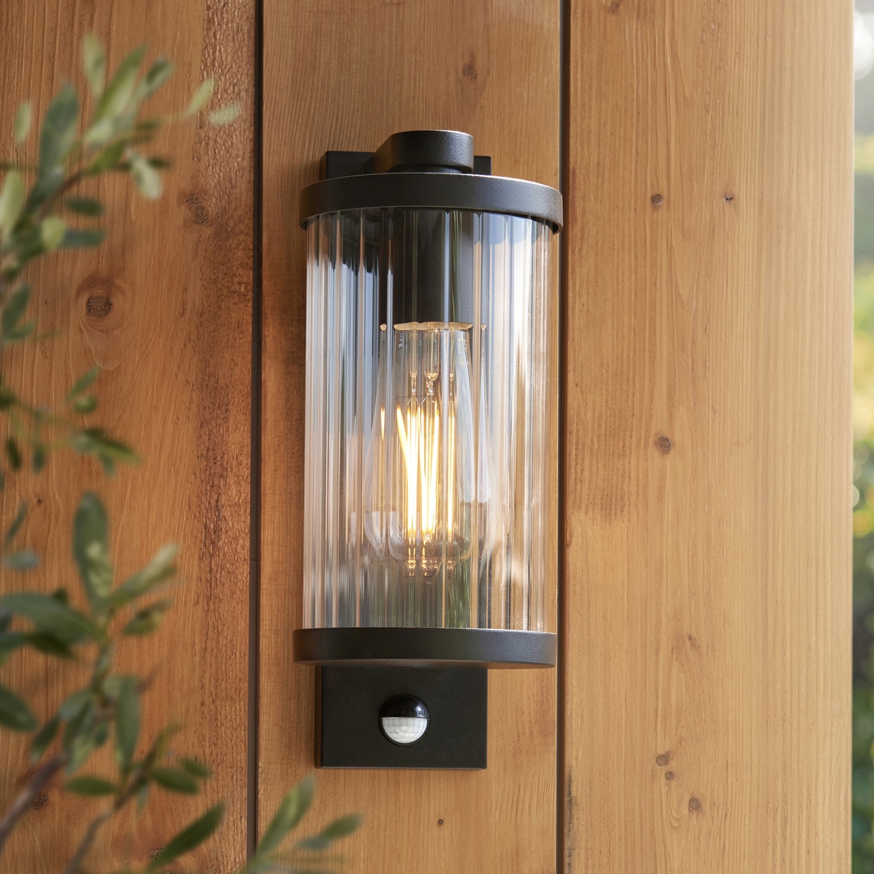 Endon Newcombe Outdoor Wall Light in Matt Black and Clear Ribbed Glass 1