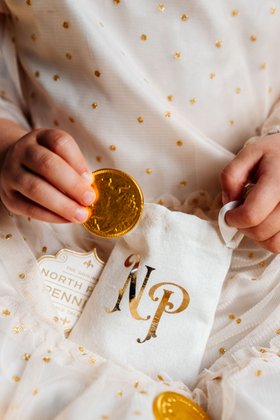 April & White  North Pole Pennies