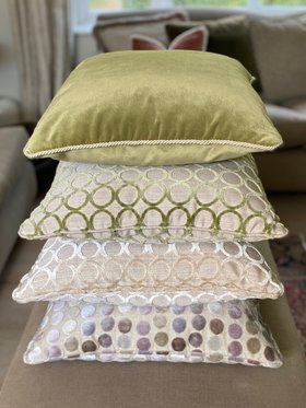 Moss green velvet cushion with cord trim