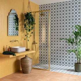 Statements™ Casablanca Tile and shown in shower area and Ribbon™ Mustard Tile (5.3cm x 30cm), £71.70m²with Cotto Tile (20cm x 20cm), £59.50m² on the floor