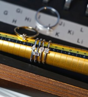 Ring Sizing Workshop Still Life with 18k Gold Diamond Ring Stack