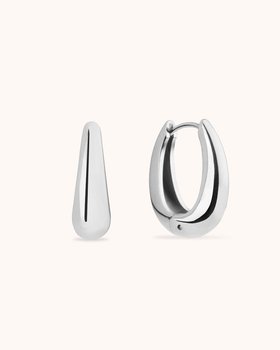 Thick Oval Seamless Huggie Earrings in Silver