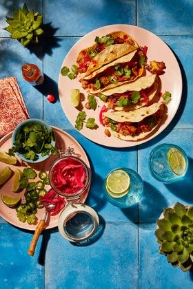 Spicy cauliflower and bean tacos with pickled red onions