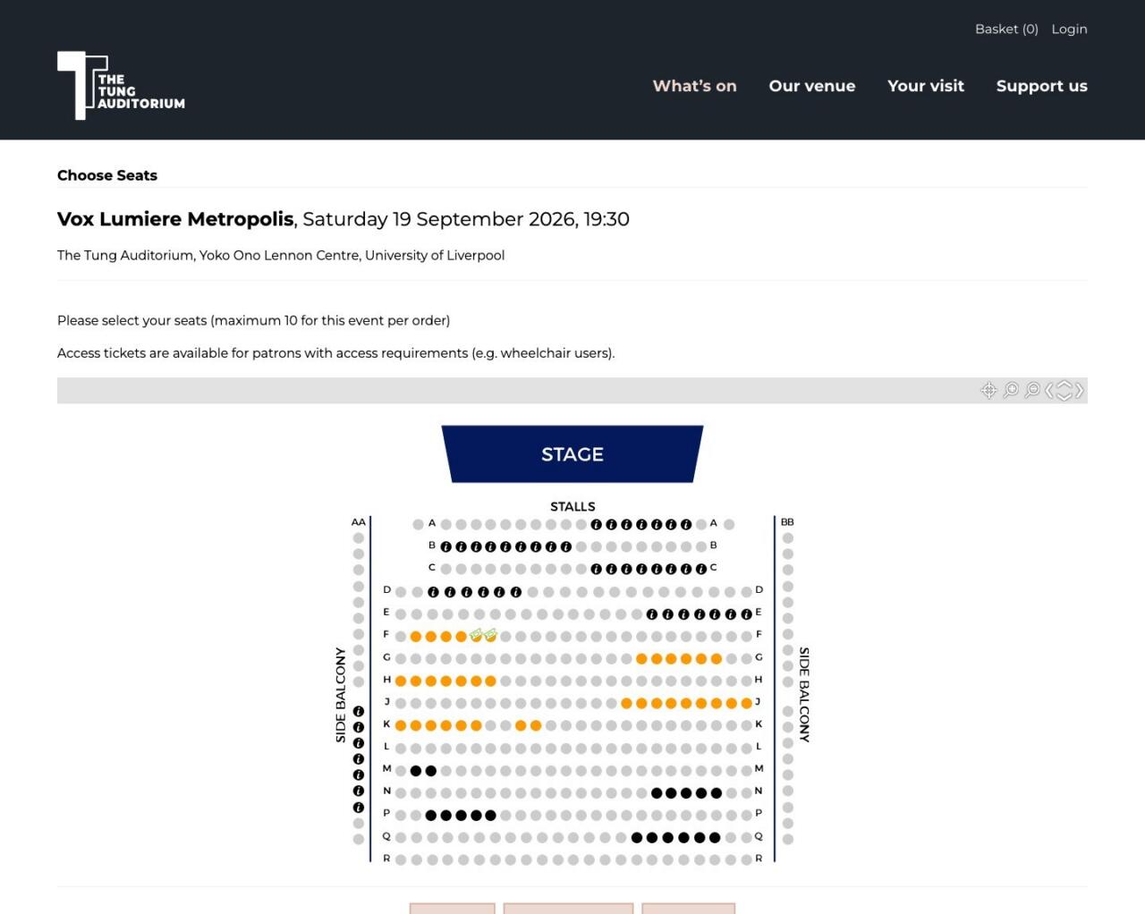 The seat selection step of the booking journey, showing an interactive seating plan of the stalls and side balconies with the stage at the top, inside the venue’s own site design.