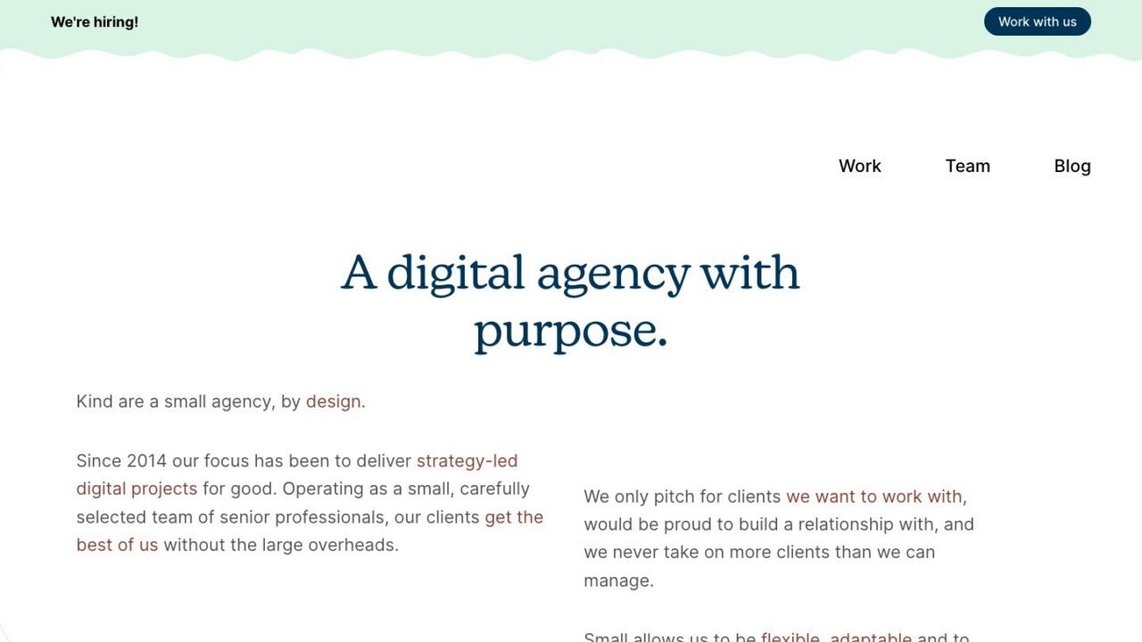 The 2022 version of the Kind website, a Craft CMS build, with the headline “A digital agency with purpose” set in a serif face above a mint green wave.