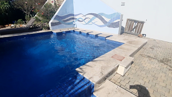 Mosaic pool splash back wall