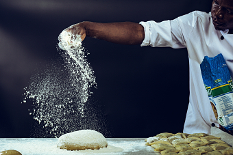CHEF PORTRAITS KNEADING DOUGH WHEAT FLOUR
