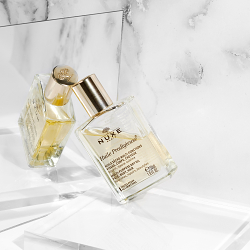 Nuxe cosmetics with reflections