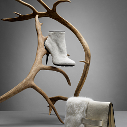 Still life with handbags and antlers