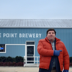 The Colonie’s Bob Ackerman Cuts Blue Point Brewing Company’s Humorous Homage to its Hometown