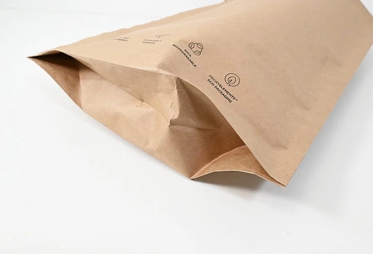 Bottom gusset paper mailing bag showing the single base gusset opened for extra depth