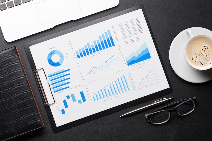 office-workplace-table-with-charts-4RP3FCV online marketing data