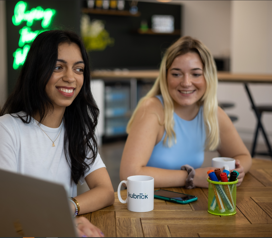 Two women smiling