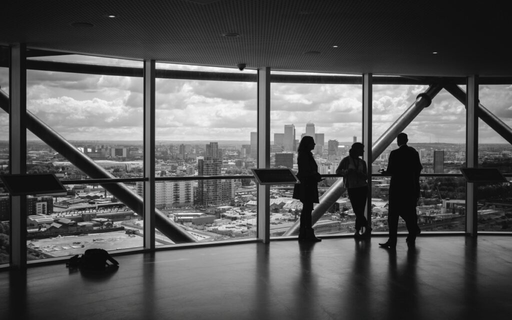 People in a business meeting discussing a potential biotech acquisition