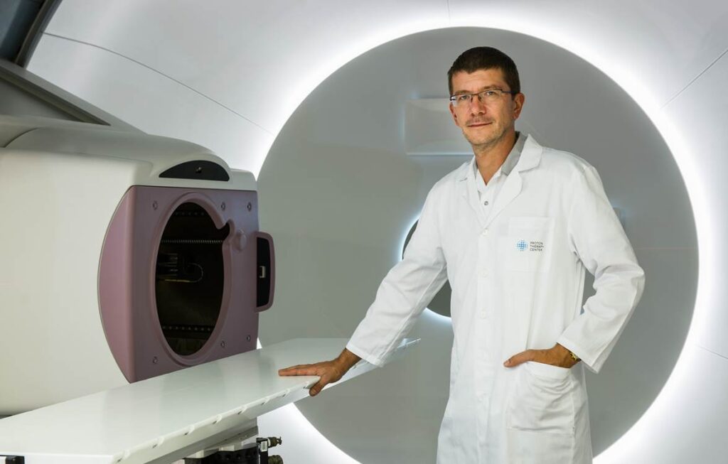 Dr Jiří Kubeš at Proton Therapy Center Prague discussing radiotherapy immune system research.