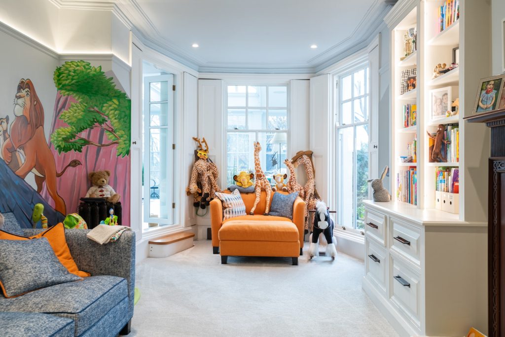Period home with bay windows and cartoon wallpaper, used as a multi-backdrop location