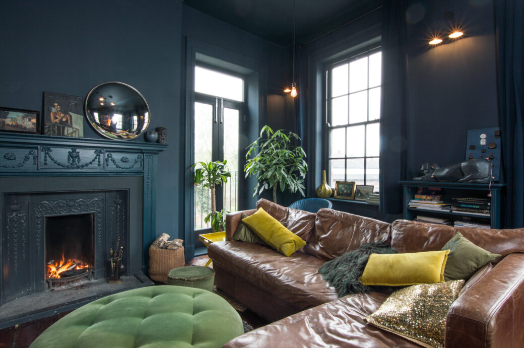 Living room with dark walls and fireplace, cheshire shoot locations