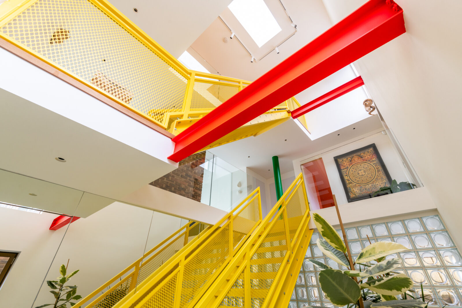 Yellow metal staircase at architectural home in leeds, Yorkshire shoot locations