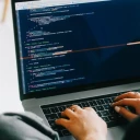Female developer working on laptop