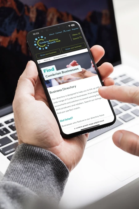 Mockup of a man using his iphone 11 pro at the office portrait