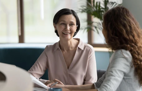 Older woman in careers meeting 2