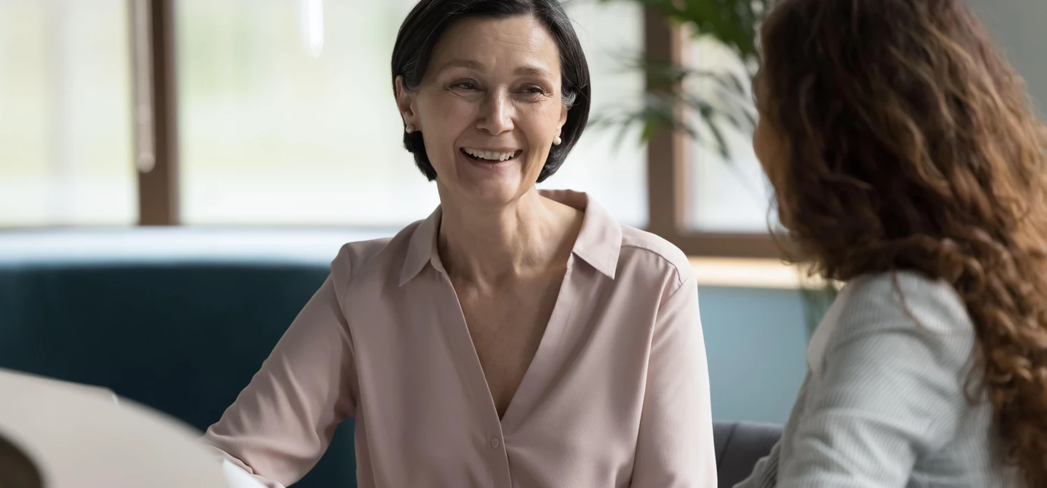 Older woman in careers meeting 2