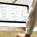 Mockup of a man working with an imac m35839