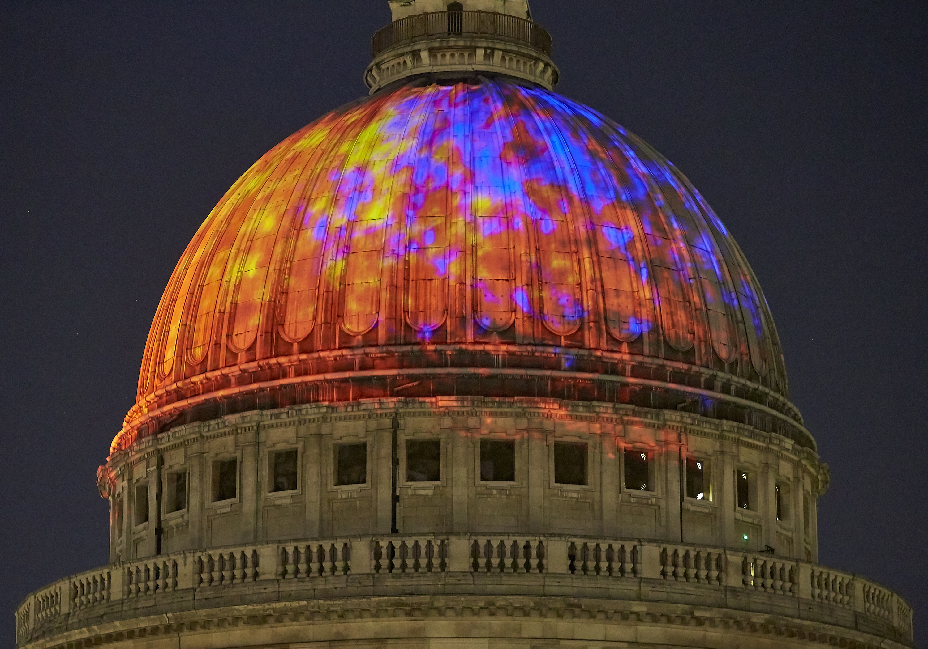 Test projection of Fires of London: orange, yellow and purple squares of light projected onto the dome of St Paul's Cathedral