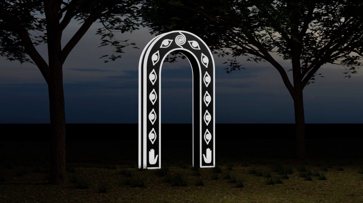 A tall illuminated archway installation set outdoors between two trees at dusk. The arch is black with white glowing outlines and decorated with repeating motifs of stylized eyes and hands. A spiral design sits at the top centre of the arch.