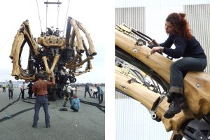 Two photographs of La Machine's giant wooden spider being prepared. On the left, crew members in harnesses and hard hats work around the spider as it stands rigged with cables on an open tarmac site. On the right, a woman with red hair sits astride one of its legs, brushing the timber, with hydraulic hoses and brass fittings beside her.