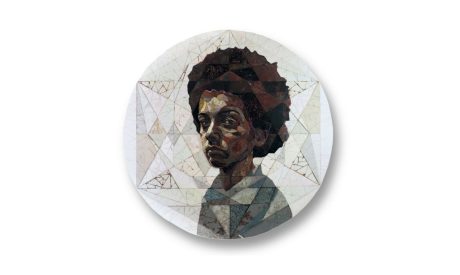 Circular mosaic artwork portrait of a young Black person with a voluminous afro, pieced together from cracked ceramic tile fragments in muted browns and greys. The figure is set against a pale, geometric star patterned background and wears a blue-grey collared garment.