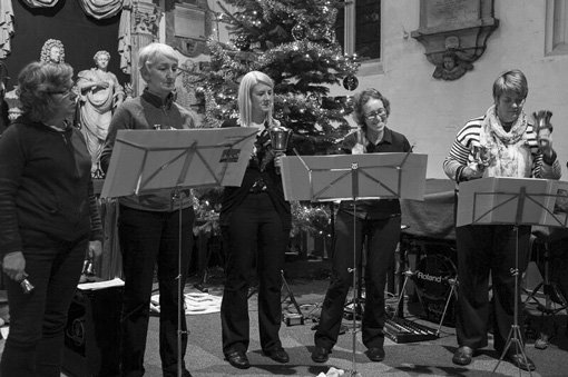 Handbell ringers rehearsing
