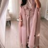 4-Piece Abaya Set: If you are looking for the perfect special occasion abaya, don't let this one pass you by. The blend of Organza and Silk fabric make it sophisticated. It features open front abaya, belt, sheila, and inner dress.