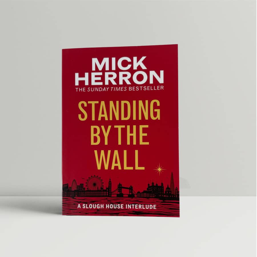 mick herron standing by the wall 1