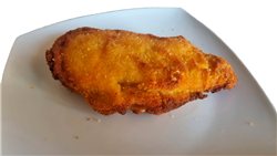 Breaded chicken fillet.
