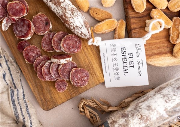 Fuet Especial 170g. se traduce al alemán como "Fuet Especial 170g." ya que es un nombre de producto específico y no requiere traducción. Si necesitas una descripción adicional en alemán, por favor indícamelo.-lateral